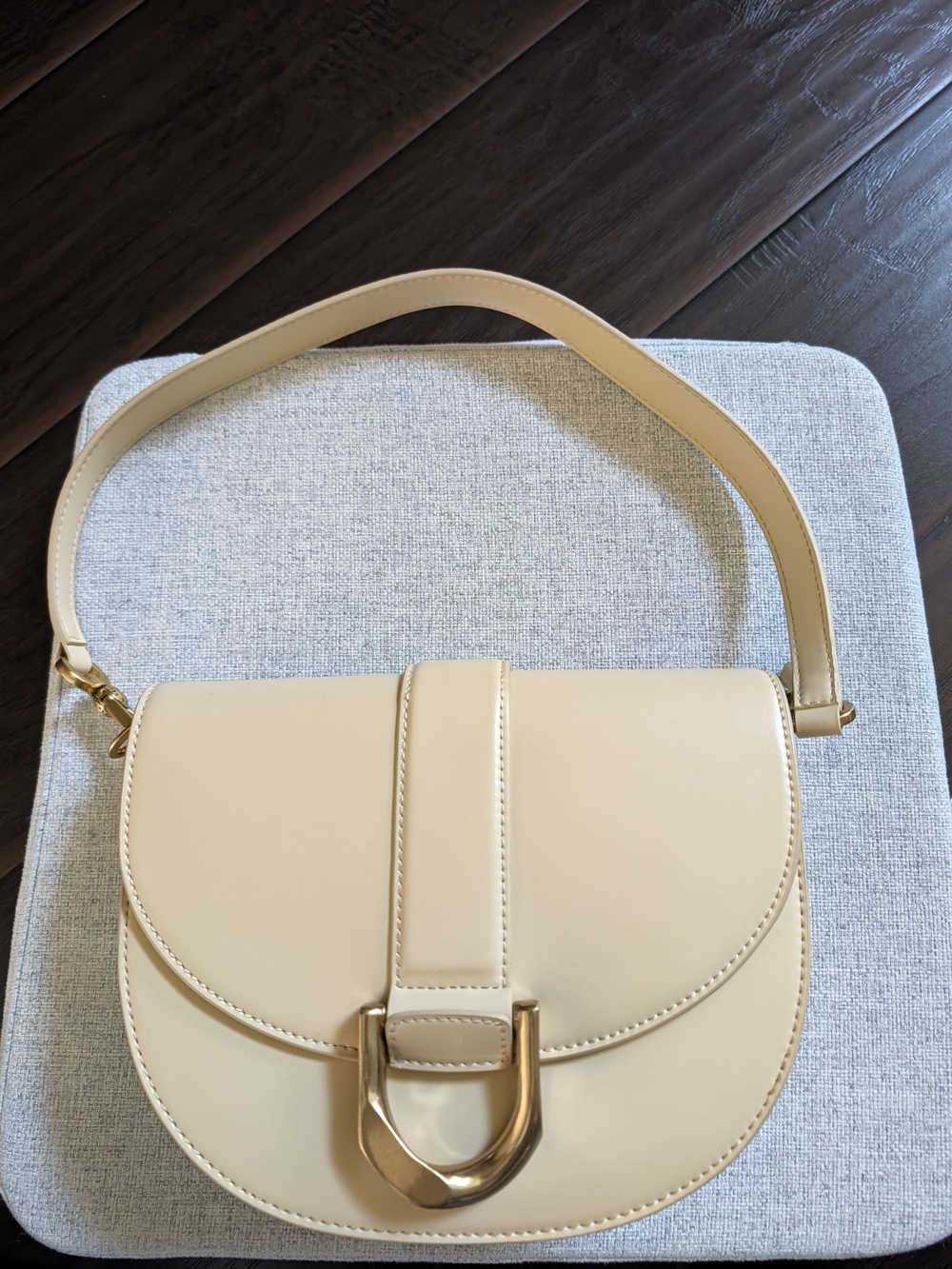 Charles & Keith Neutral Cream Shoulder Saddle Bag with Gold Hardware